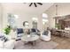 Bright living room featuring modern furniture, high ceilings, and an open floor plan with lots of natural light at 5426 E Karen Dr, Scottsdale, AZ 85254