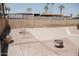 Spacious backyard with brick accents, gravel landscaping, and block wall fencing at 5602 W Heatherbrae Dr, Phoenix, AZ 85031