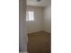 Neutral bedroom with carpet and window with window coverings offering natural light at 5602 W Heatherbrae Dr, Phoenix, AZ 85031