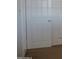 A sturdy bedroom door offers privacy and separation with its clean, white, four-panel design at 5602 W Heatherbrae Dr, Phoenix, AZ 85031