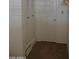Hallway with closet and built-in drawers, next to a door way, provides ample storage solutions at 5602 W Heatherbrae Dr, Phoenix, AZ 85031