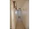Hallway features tile flooring, neutral paint, and doorways leading to other rooms in the home at 5602 W Heatherbrae Dr, Phoenix, AZ 85031