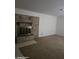 Cozy living room featuring a brick fireplace, perfect for relaxation and warmth at 5602 W Heatherbrae Dr, Phoenix, AZ 85031