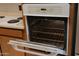 A kitchen oven with digital display and metal racks at 5602 W Heatherbrae Dr, Phoenix, AZ 85031