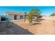 Spacious backyard with gazebo, concrete patio, block fence, and desert landscaping at 5951 W Granada Rd, Phoenix, AZ 85035