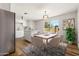 Charming dining area, situated near the kitchen and lit by natural light at 5951 W Granada Rd, Phoenix, AZ 85035