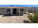 Inviting home exterior with covered parking, a desert landscaped yard and convenient walkway at 5951 W Granada Rd, Phoenix, AZ 85035