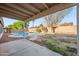 Inviting backyard with a refreshing pool and mature landscaping, great for outdoor enjoyment at 6805 S 14Th St, Phoenix, AZ 85042
