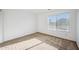 An open bedroom features neutral carpet, a large window for natural light and ample space at 6805 S 14Th St, Phoenix, AZ 85042