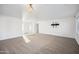 This spacious living room features neutral walls and carpet, offering versatility for various design styles at 6805 S 14Th St, Phoenix, AZ 85042