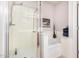 Clean bathroom featuring a glass-enclosed shower and a separate soaking tub at 705 W Queen Creek Rd # 2062, Chandler, AZ 85248