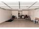 Spacious two car garage featuring epoxy floors and ample storage for organization and convenience at 705 W Queen Creek Rd # 2062, Chandler, AZ 85248