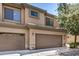 Home featuring a two-car attached garage showcasing its convenient access and curb appeal at 705 W Queen Creek Rd # 2062, Chandler, AZ 85248