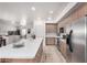 Bright, open kitchen with a large island, stainless appliances, and modern finishes at 705 W Queen Creek Rd # 2062, Chandler, AZ 85248