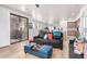 Stylish living room with a sliding glass door, comfortable seating, and an open concept layout at 705 W Queen Creek Rd # 2062, Chandler, AZ 85248