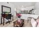 Inviting living room with a stylish desk area and comfortable seating at 705 W Queen Creek Rd # 2062, Chandler, AZ 85248