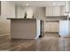 Kitchen featuring a peninsula with granite countertops and stainless steel appliances at 761 W Gail Dr, Chandler, AZ 85225