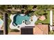 Aerial view of a backyard oasis featuring a custom pool, mature landscaping, and a charming gazebo at 786 E Coconino Dr, Chandler, AZ 85249