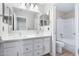 Beautiful bathroom with double sinks, large mirrors, and updated fixtures at 786 E Coconino Dr, Chandler, AZ 85249