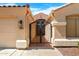 Wrought iron gate with brick walkway and a well-lit covered entryway at 786 E Coconino Dr, Chandler, AZ 85249