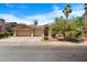 Beige home with a terracotta roof, two-car garage, and well-manicured front yard landscaping at 786 E Coconino Dr, Chandler, AZ 85249
