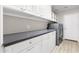 Practical laundry room with ample storage, counter space, and modern machines at 786 E Coconino Dr, Chandler, AZ 85249