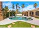 Gorgeous backyard oasis with a refreshing pool, covered patio, and meticulous landscaping at 786 E Coconino Dr, Chandler, AZ 85249