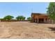 Large backyard view showing the home's large yard space and exterior at 833 S 113Th Ave, Avondale, AZ 85323