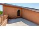 A concrete balcony with access to the house via a glass door at 833 S 113Th Ave, Avondale, AZ 85323