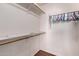 Spacious walk-in closet features ample shelving and hanging space at 833 S 113Th Ave, Avondale, AZ 85323
