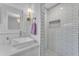 Beautiful bathroom features a tiled shower, vanity, and modern fixtures at 908 E State Ave, Phoenix, AZ 85020