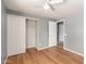 Bedroom featuring a closet and hardwood floors at 10115 W Turney Ave, Phoenix, AZ 85037