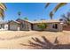 Charming single-story home with desert landscaping and attached two-car garage at 10115 W Turney Ave, Phoenix, AZ 85037