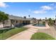The backyard has a pool with brick trim and mature landscaping at 10410 W Royal Palm Rd --, Peoria, AZ 85345