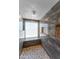 Modern shower boasts marble-like tiling, shower niches and pebble floor with window for light at 10410 W Royal Palm Rd --, Peoria, AZ 85345