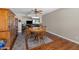Hardwood floors and natural light define this traditionally furnished dining room at 10410 W Royal Palm Rd --, Peoria, AZ 85345
