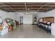 Spacious garage with epoxy floors and ample storage, ready for your projects and vehicles at 10410 W Royal Palm Rd --, Peoria, AZ 85345