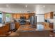 Spacious kitchen with stainless steel appliances, recessed lighting, island with marble countertop at 10410 W Royal Palm Rd --, Peoria, AZ 85345