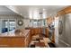 Bright kitchen featuring stainless steel appliances, granite countertops, and backyard views at 10410 W Royal Palm Rd --, Peoria, AZ 85345