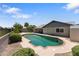 The backyard has a private pool and the landscaping has mature trees at 10410 W Royal Palm Rd --, Peoria, AZ 85345
