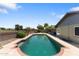 The large backyard has a rectangular pool with brick trim and mature landscaping at 10410 W Royal Palm Rd --, Peoria, AZ 85345