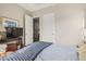 Cozy bedroom featuring a TV and neutral decor, perfect for relaxation at 10713 N 124Th Pl, Scottsdale, AZ 85259