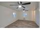 This bedroom features wood floors, two windows for light and ceiling fans for added comfort at 11014 W Cocopah St, Avondale, AZ 85323