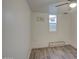 Bedroom with wood floors, ceiling fan, and natural light to creat a cozy space at 11014 W Cocopah St, Avondale, AZ 85323
