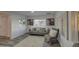 Bright living room featuring gray sofa, chairs and zebra art prints at 11014 W Cocopah St, Avondale, AZ 85323