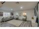 Open living room showcasing neutral decor and hardwood-style floors at 11014 W Cocopah St, Avondale, AZ 85323