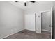 Bedroom featuring neutral walls, carpet, and a sliding door closet at 1102 N 5Th St, Buckeye, AZ 85326