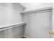 Walk-in closet providing ample shelving for optimal storage at 1102 N 5Th St, Buckeye, AZ 85326