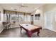 Resident Billiard Room offering a pool table, seating, and ample natural light at 11375 E Sahuaro Dr # 2033, Scottsdale, AZ 85259