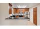 Well-lit kitchen with stainless steel appliances, and granite countertops at 11375 E Sahuaro Dr # 2033, Scottsdale, AZ 85259